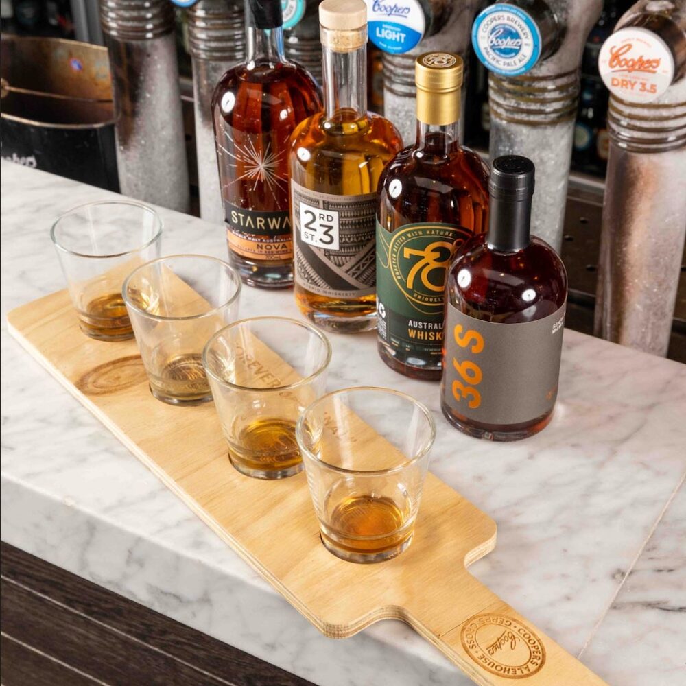 Coopers Alehouse tasting paddle with four spirits