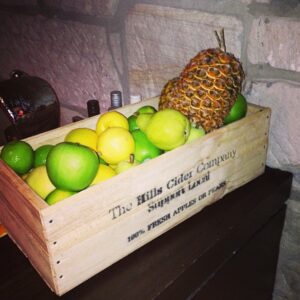 Lemons and limes beautifully displayed in this little wood crate