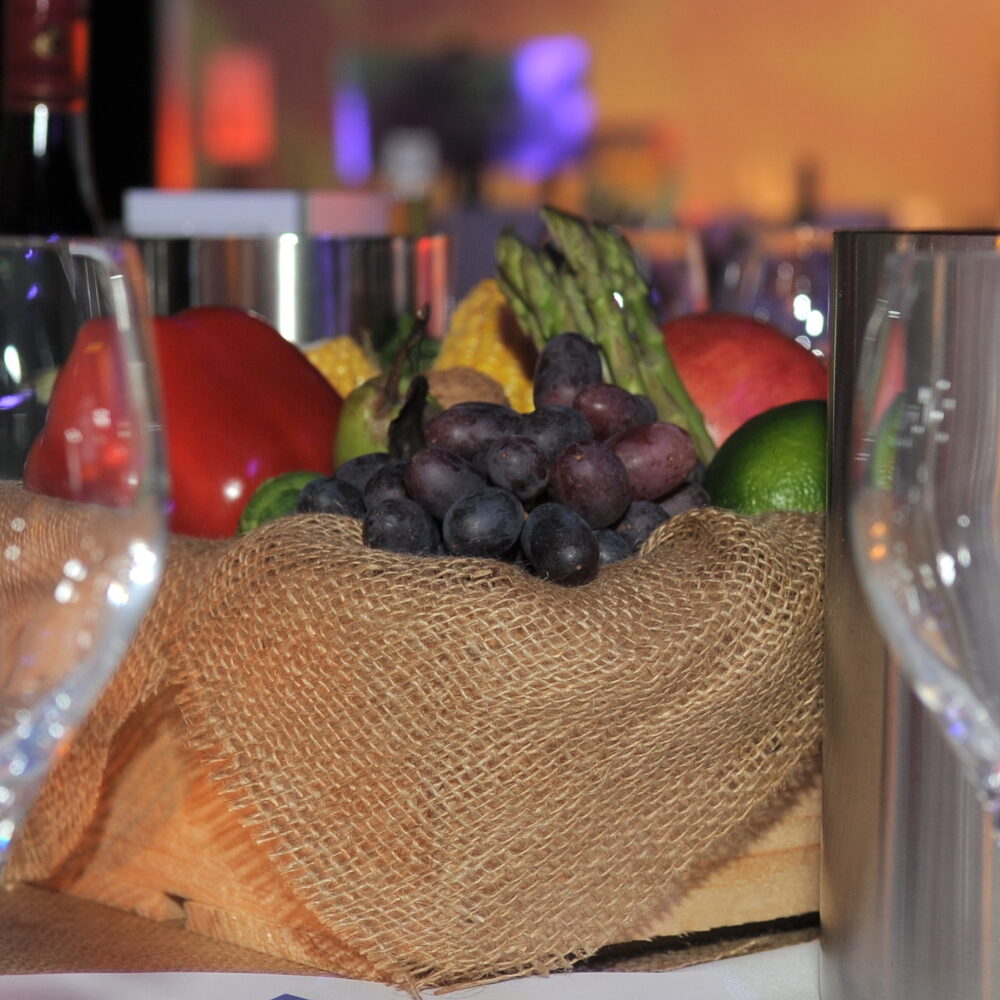 Fresh fruit and veg table centrepiece at event